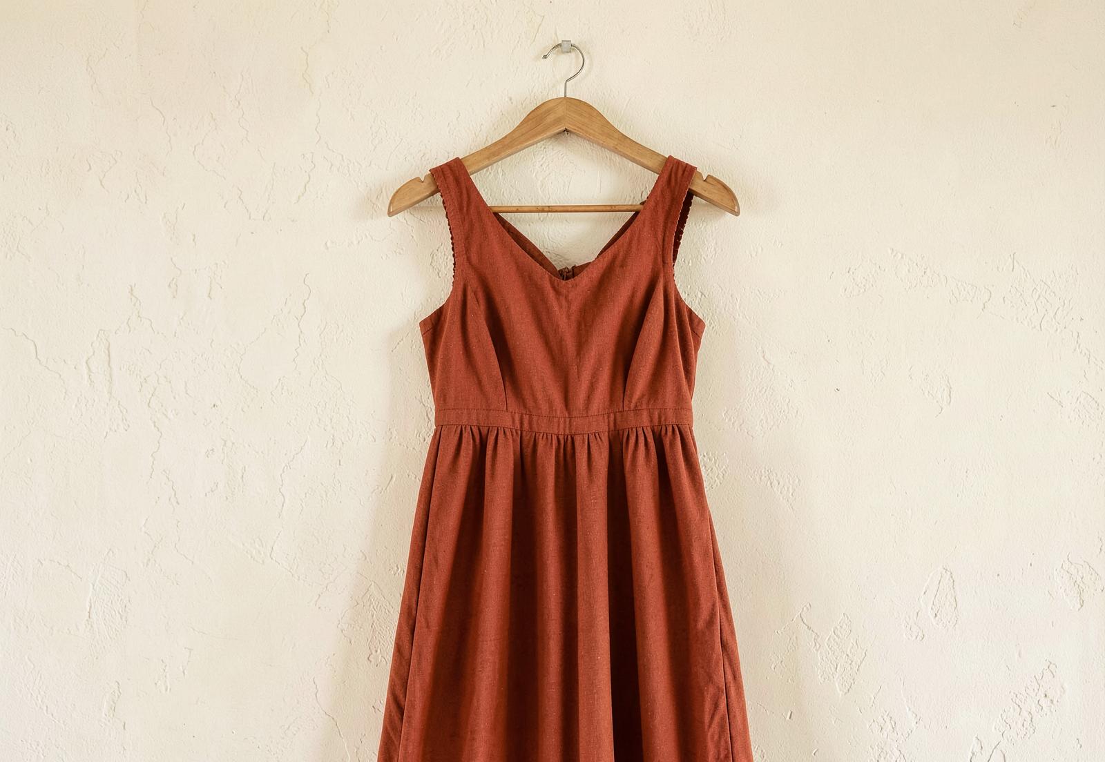 A vintage dress in rust and cream tones