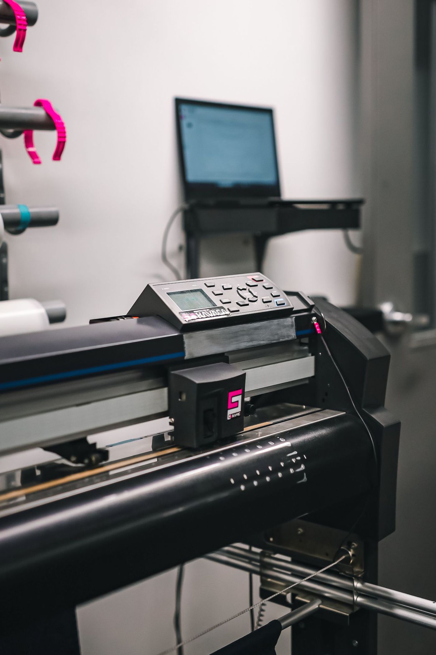 A large format printing machine producing wide printed material