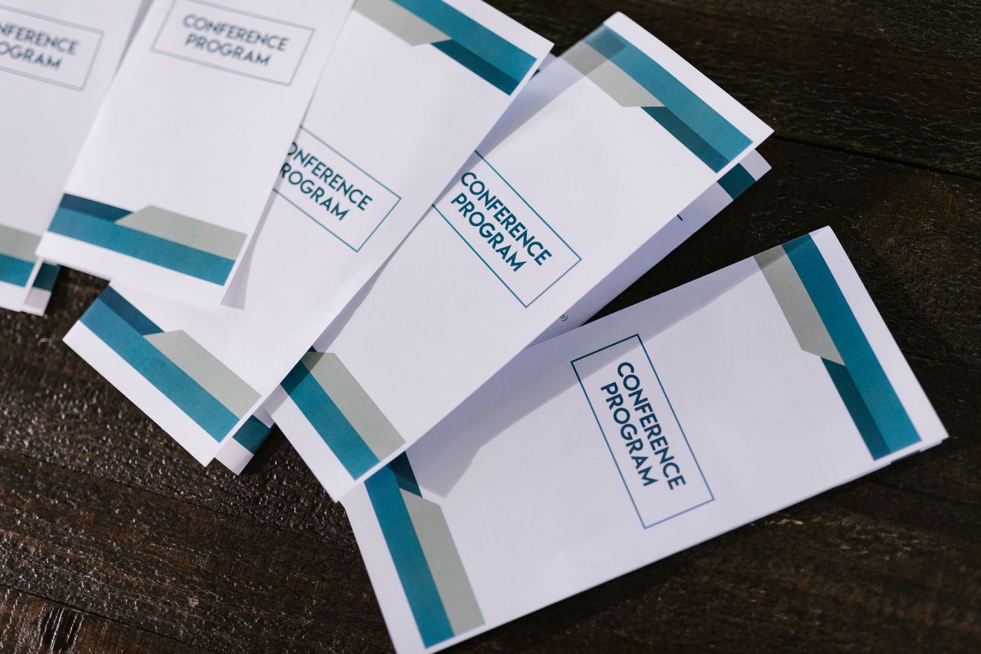 Freshly printed programmes stacked on a table